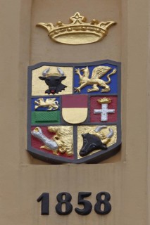 Coat of arms with date on the World Heritage House, built in 1858, former main guard, crown,