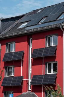 Residential building with photovoltaic modules on the façade and roof, North Rhine-Westphalia,