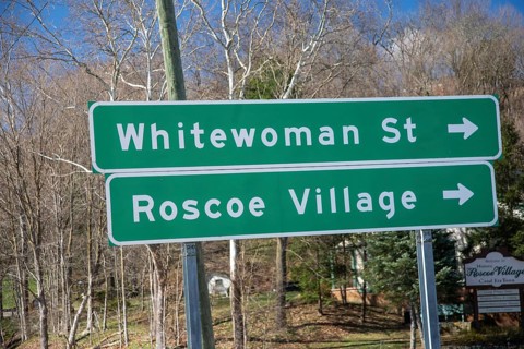 Coshocton, Ohio - A sign points to Whitewoman Street in Historic Roscoe Village. Whitewoman Street