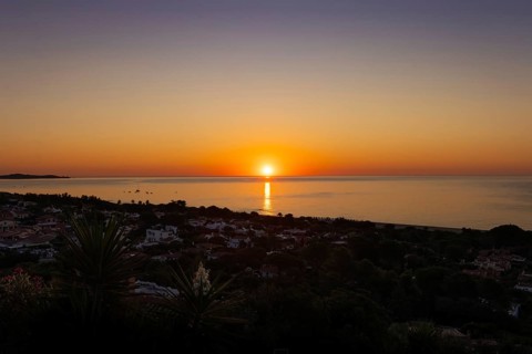 The sun rises on the Costa Rei, a stretch of coastline on the Italian Mediterranean island of