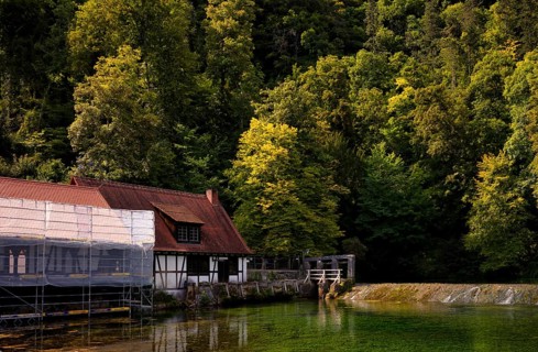 Construction site at the Blautopf, scaffolding, scaffolded mill without mill wheel, water wheel,