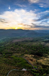 Panorama of Sunset over Mountains and Coniston Water from drone, Lake District National Park,