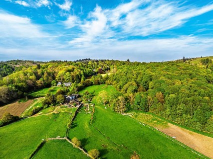Farms over Coniston Water from drone, Lake District National Park, Cumbria, UK