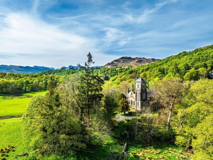 Holy Trinity Church from a drone, Bog Lane, Brathay village, Lake District, Cumbria, England,