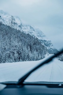 Winter road trip on the Icefields Parkway with lots of snow and ice, Banff National Park, Jasper