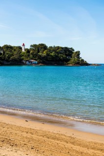 Picturesque beach and lighthouse, Plage de La Baumette, Saint-Raphaël, Massif de l'Esterel, Esterel