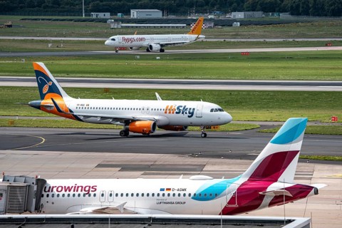 Düsseldorf Airport, Eurowings Airbus aircraft on the apron, HiSky Europe Airbus A320-200 on