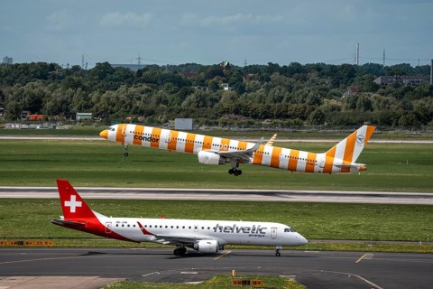 Düsseldorf Airport, Condor Boeing 757-330 on take-off, Helvetic Airways Embraer E190LR on the way