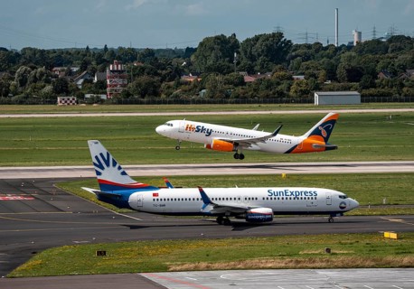Düsseldorf Airport, Sunexpress Boeing 737 aircraft on the apron, HiSky Europe Airbus A320-200