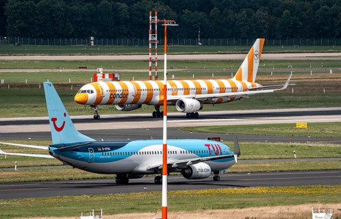 Düsseldorf Airport, Condor Airbus on take-off, TUIFly Boeing 737 on the way to take-off, North
