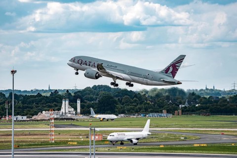 Düsseldorf Airport, Qatar Boeing 787-8 Dreamliner on take-off, Eurowings Airbus aircraft after