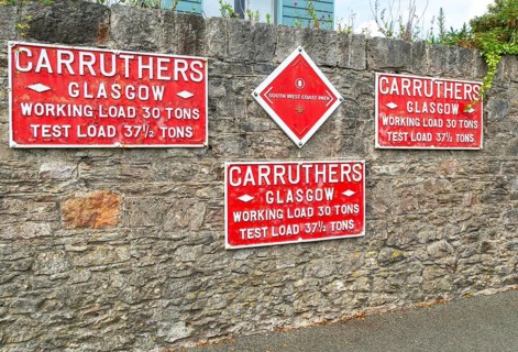 South West coast path sign on wall, vintage dock signs Carruthers Glasgow, Hoe Road, city of