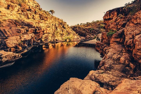 Bell Gorge waterfall, a body of water in north-west Australia in the Kimberley. Sunrise in the