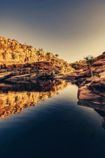 Bell Gorge waterfall, a body of water in north-west Australia in the Kimberley. Sunrise in the