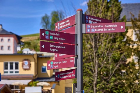 Tourist signposts, sights, general architecture, trees, depth of field, blue sky, cirrostratus