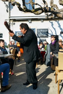 Traditional guitar player, singer in a restaurant, pilgrimage in Saintes-Maries-de-la-Mer,