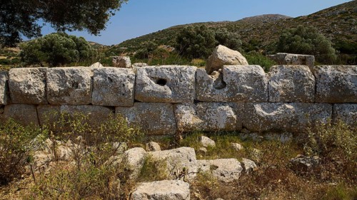 Ancient stone ruin wall in a nepuprajöen natural scenery under a clear sky, Artemis temple,