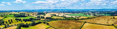 DefaultPanorama of Farms and Fields over Torquay from a drone, Devon, England, United Kingdom