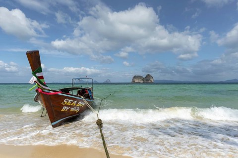 Longtail boat on the beach, Koh Ngai Island, Andaman Sea, Satun Province, Southern Thailand,