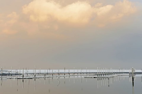 Winter day, onset of winter, snow on the jetties in the marina, North Sea, Norddeich, Lower Saxony,