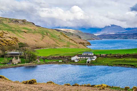 Farms over Loch Harport, Drynoch, Isle of Skye, Scotland, UK