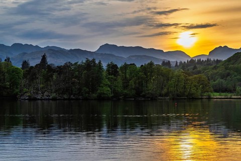 Sunset over Windermere Lake from a drone, Ambleside, Lake District, Cumbria, England, United
