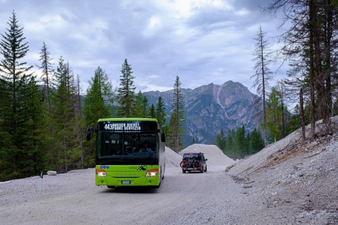 Public bus, public transport and campers on the toll road, Prato Piazza, Alta Braies, Braies