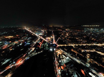 Aerial view of the Umayyad Square shining at night