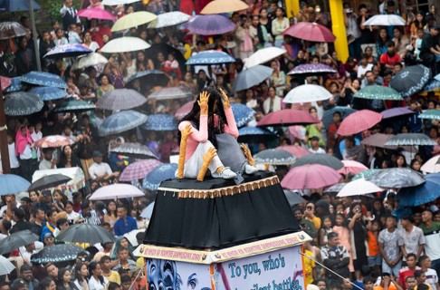 People from the Pnar community move around a Rot themed stop women harrasment as they celebrate an