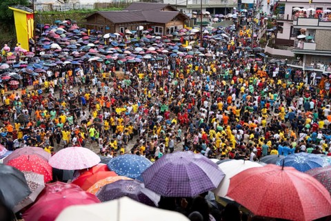 JOWAI, INDIA - JULY 14: People from the Pnar community march in a circle as they celebrate an event