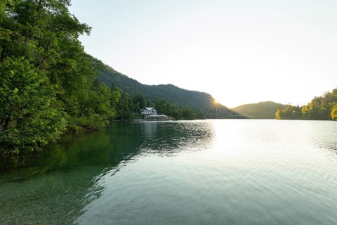 Sunrise in summer at Lake Thumsee near Bad Reichenhall with a view of the Seewirt