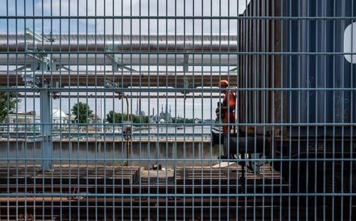 Lattice fence on the factory bridge over the River Main in Kelsterbach, Hesse, Germany