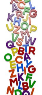 Vertical plastic magnetic letters with drop shadow randomly scattered on surface with drop shadow