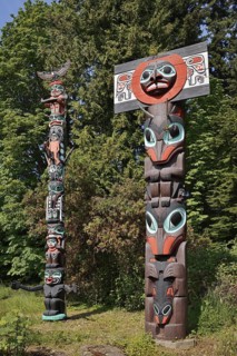 Totem poles, Chief Skedans Mortuary Totem Pole and Ga'akstalas Totem Pole, Stanley Park, Vancouver,