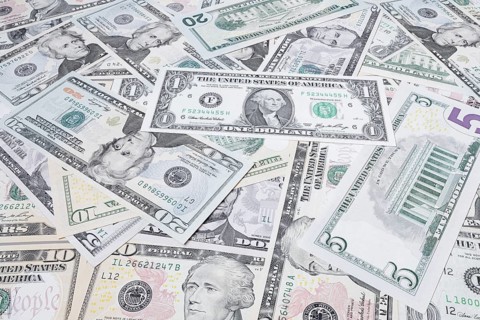 Various US dollar notes in a pile, banknotes