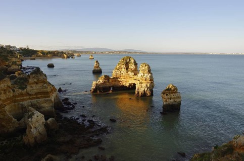 Rock formations on the coast, Praia do Camilo, Lagos, Algarve, Portugal