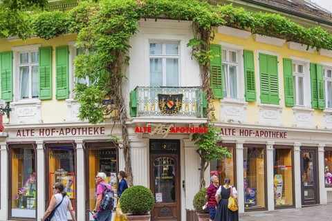 Historic pharmacy with greenery and a lively atmosphere, Baden Baden, Germany