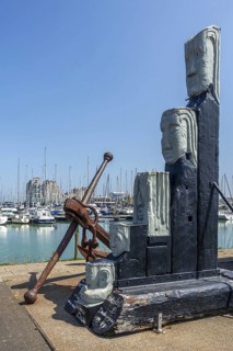 Wachters van de Schelde, sculpture by artist Omer Gielliet in the harbour of Breskens along the