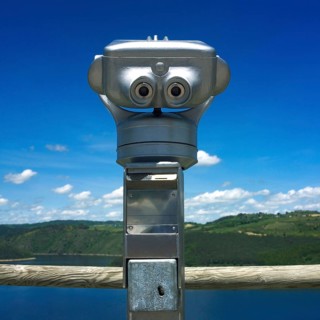 Visitors use the coin-operated binoculars in Auvergne, France, to enjoy breathtaking views of the