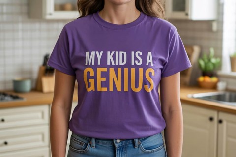Proud mother wearing purple My Kid is a Genius t-shirt in home kitchen. Commentary on modern
