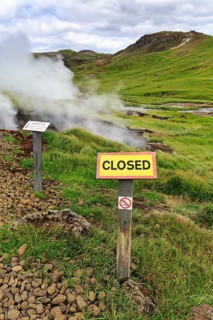 Sign with inscription closed, warning, do not enter, steaming valley, Reykjadalur bathing area,