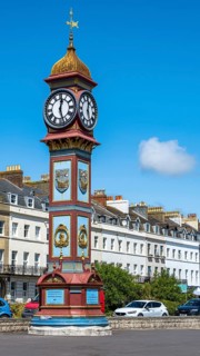 Clock tower on seaside in Weymouth, Esplanade, Weymouth, Dorset, England, United Kingdom