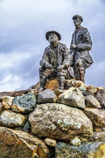 Collie and MacKenzie Statue, Sligachan Old Bridge, Isle of Skye, Scotland, UK