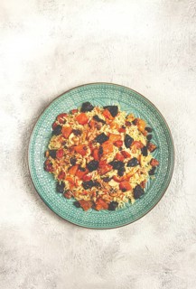 Rice dish, with the addition of dried fruits, nuts and spices of Middle Eastern cuisine, homemade,