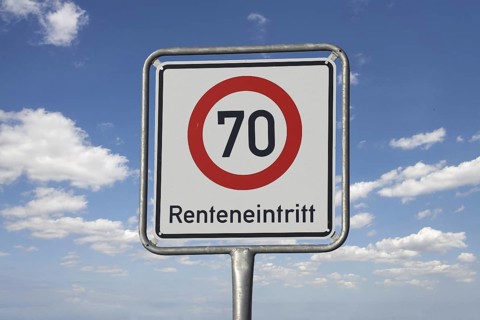 (Photomontage) Traffic sign with the inscription RENTAL ENTRANCE 70, detached in front of a blue