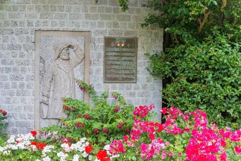 Monument, stone relief showing Jacob Andresen Siemens, founder of the seaside resort of Heligoland,