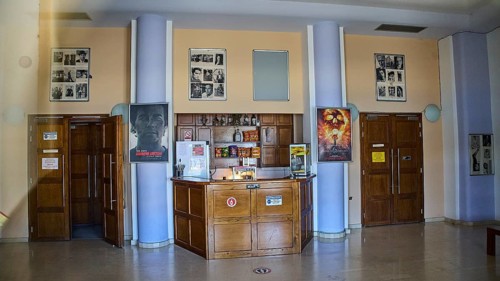 Cinema, An interior with bar, art posters and columns in a cosy ambience, Armando Bernabiti,