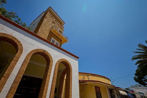 Market hall, Agora, Clock tower in clear style with arches and yellow elements, impresses in the