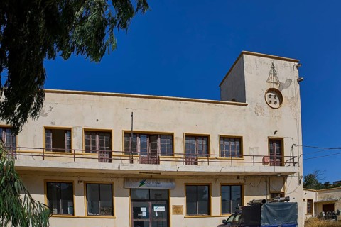 Harbour area, Vintage two-storey building with clock tower and old windows, Armando Bernabiti,