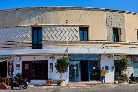 Historic commercial building with decorative elements and display windows, Armando Bernabiti,